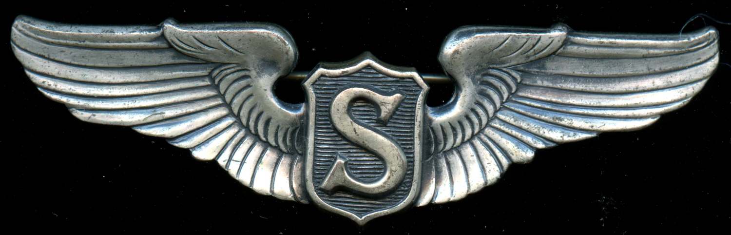 Help on identifying these WWII wings - Possible Robbins