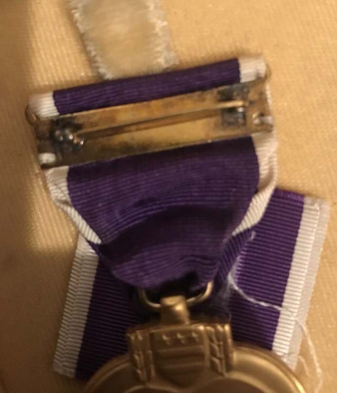 WW2 Purple Heart engraved Earl O Thresher DECORATIONS/VALOR AWARDS