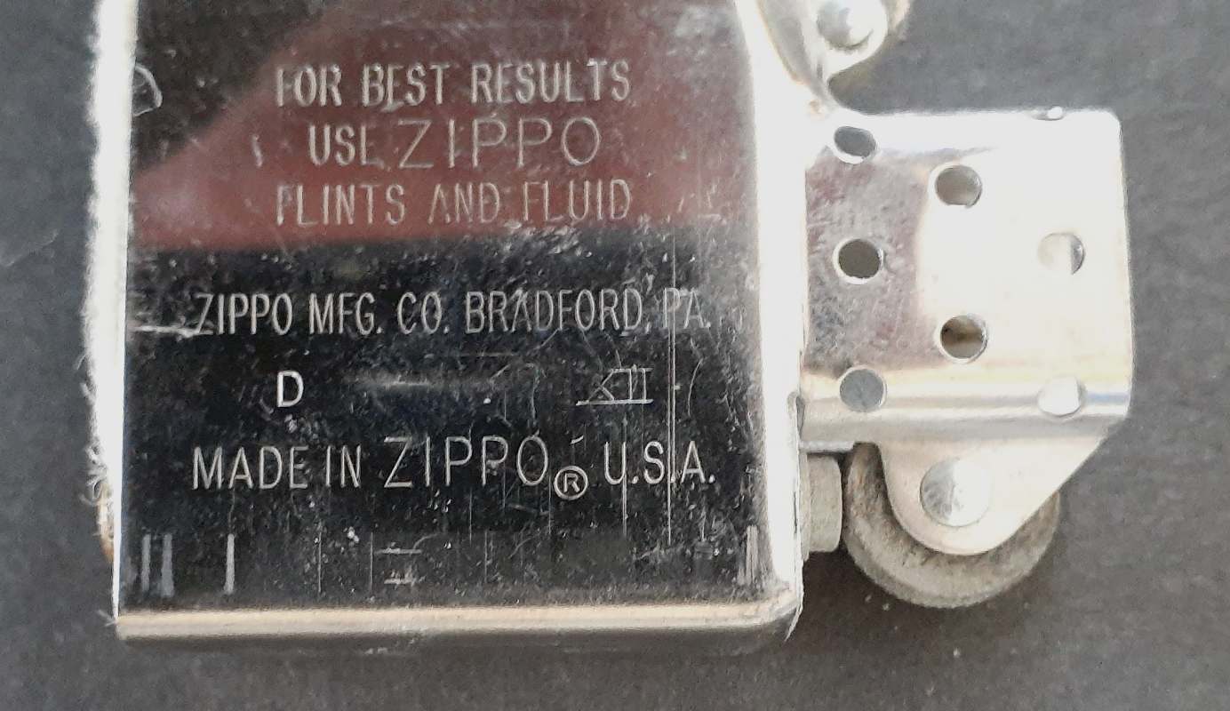 zippo1.jpg.96f1b7c4b31709bf66aedd1235b28d06.jpg