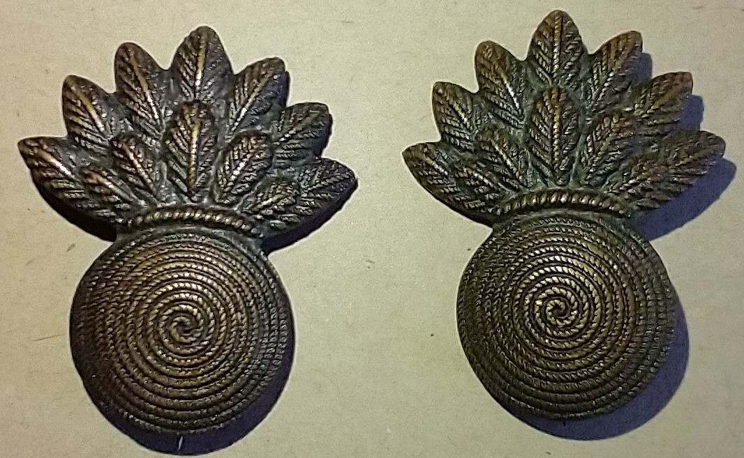 WWIUSMCGunnerInsigniafront.jpg.da0fb36e76dea5963913aa1ec78a807a.jpg