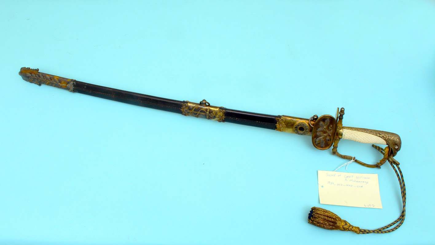 USNAM1939_003.0003PresentationSwordScabbardofCAPTWm.E.McKennyRev-2.jpeg.a8af468f40e0e05750951dfb760cfb3d.jpeg